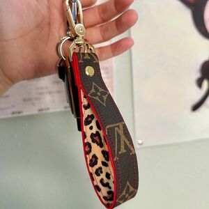 Up-cycled keychan with cheetah and red lining